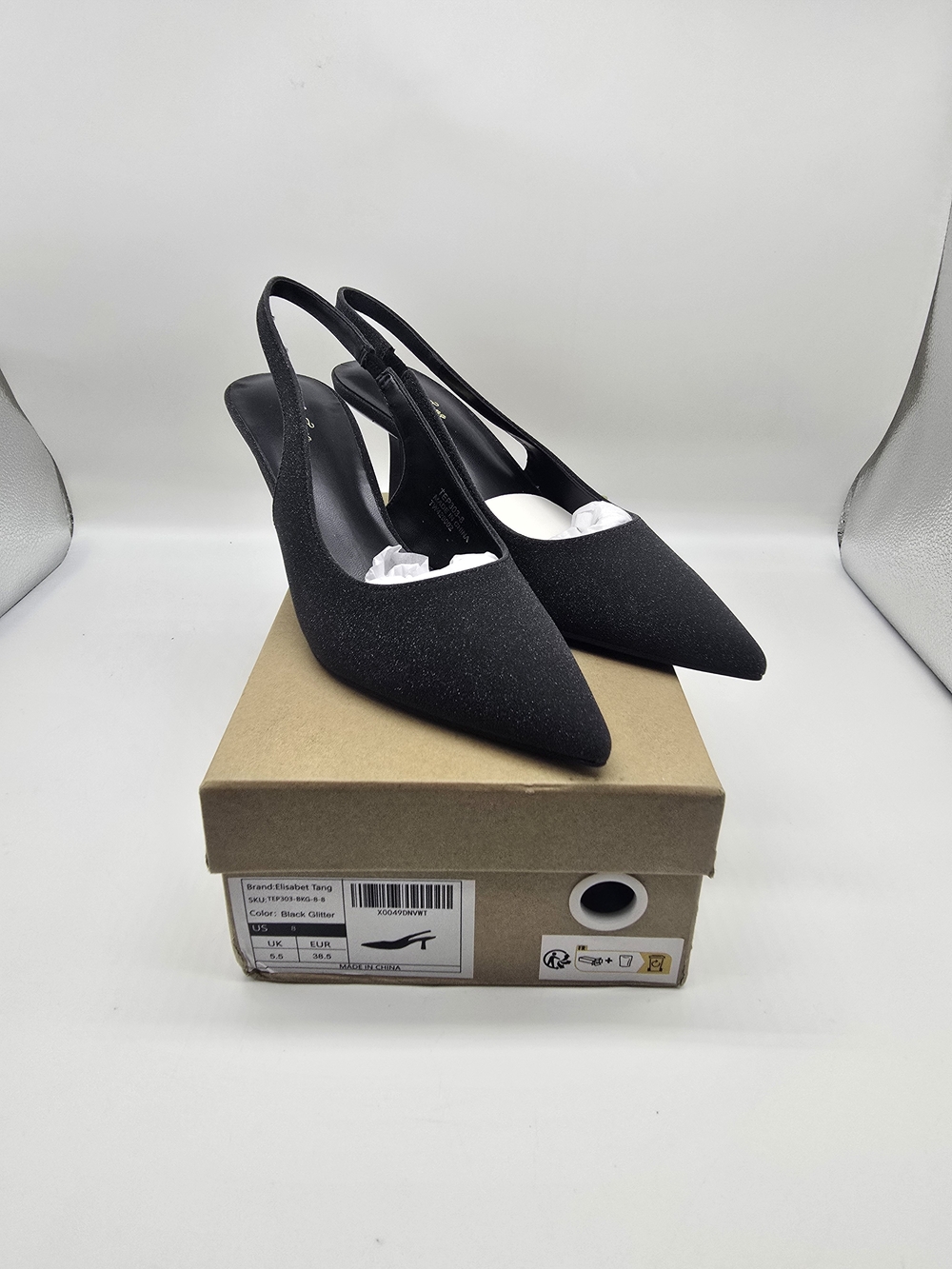 Elisabet Tang Heels